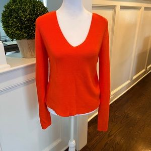 A.L.C. v neck orange sweater with slit in bottom of back XS EUC